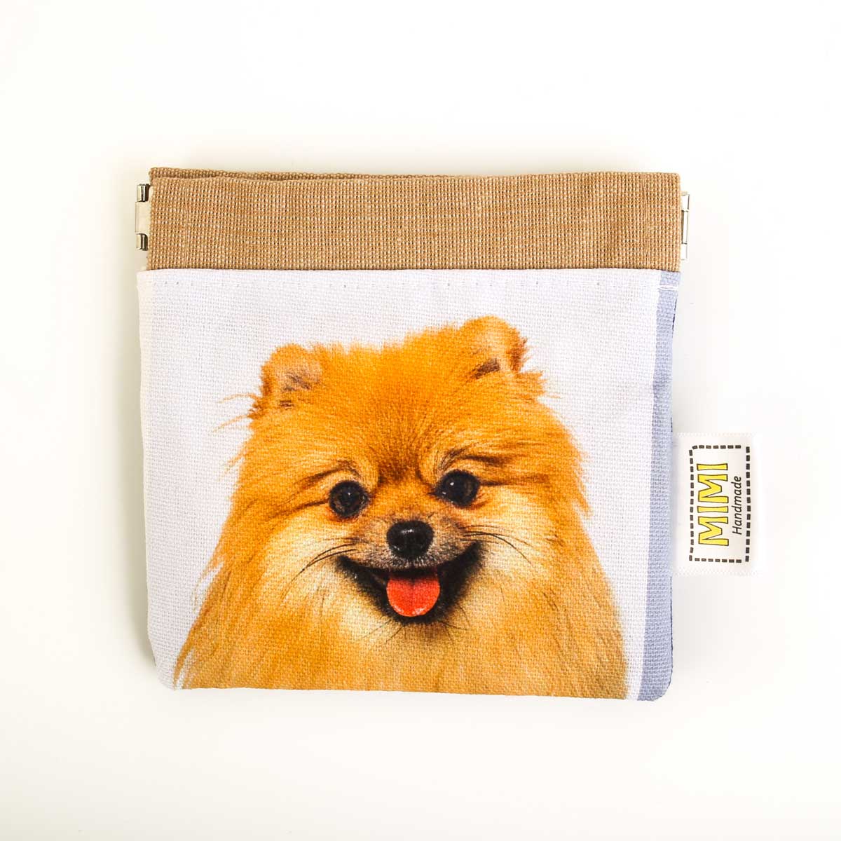 Pouch with a Pomeranian dog illustration on a white background