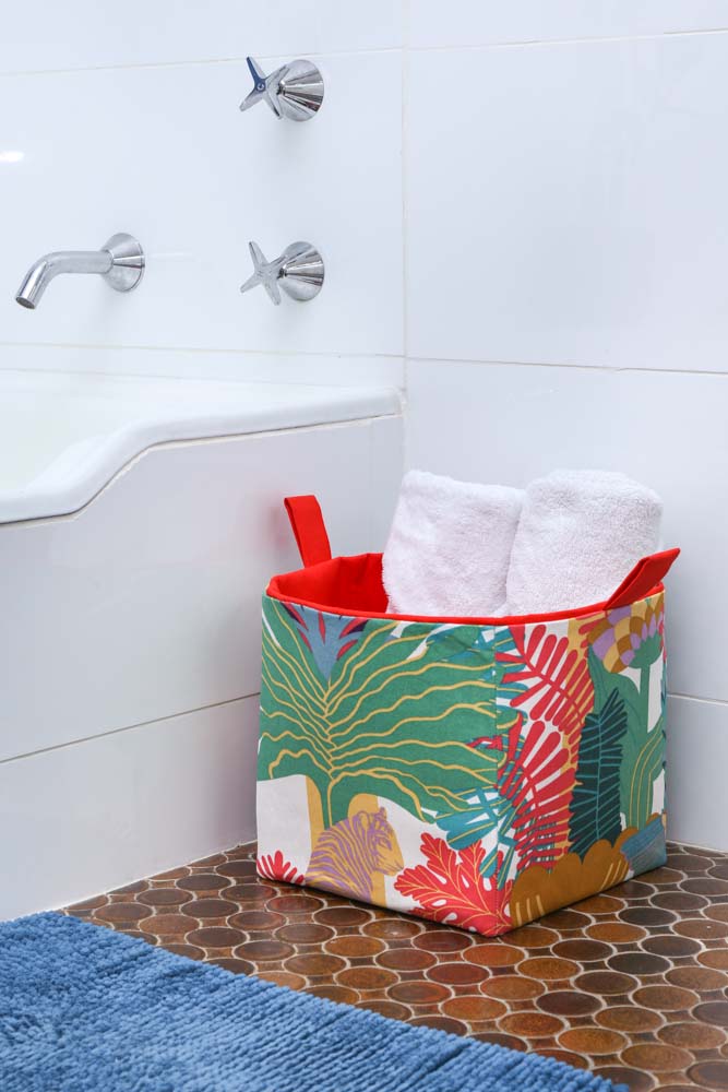 spa towels  stored in large tropical basket by MIMI Handmade