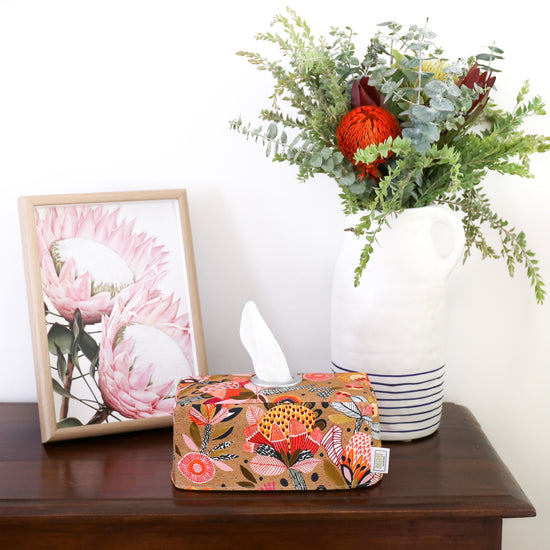 burnt-orange-protea-tissue-box-cover-handmade-in-Australia-by-MIMI-Handmade-next-to-pale-pink-protea-print-and-native-flowers-bouquet