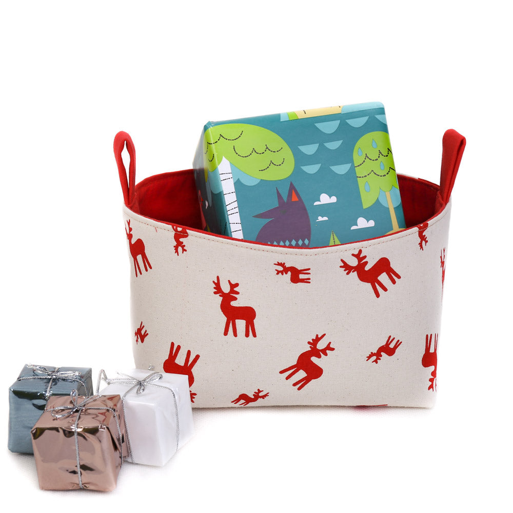 red-and-beige-Rudolph-the-reindeer-medium-Christmas-fabric-decorative-storage-basket-bag-by-MIMI-Handmade-filled-with-wrapped-presents-gift-hamper-ideas-for-Xmas