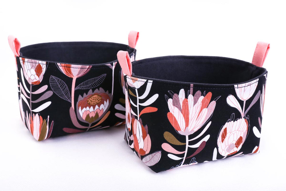 
                      
                        small-storage-baskets-black-pink-protea-print-australiana-gifts-mimi-handmade-australia
                      
                    