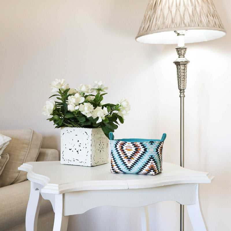 blue-geometric-aztec-decorative-basket-in-French-country-living-room