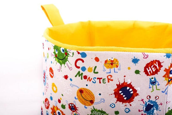 Load image into Gallery viewer, close up cool monsters yellow cube storage basket with handles mimi handmade
