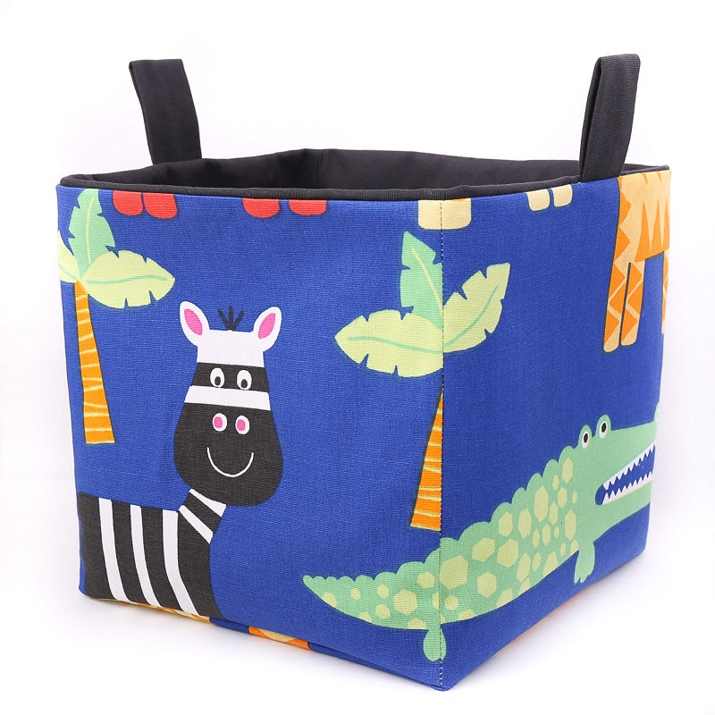 Load image into Gallery viewer, large cube fabric storage basket for kallax in blue with zebra and crocdile print, safari nursery toy storage, handmade by MIMI Handmade Baskets, Australia
