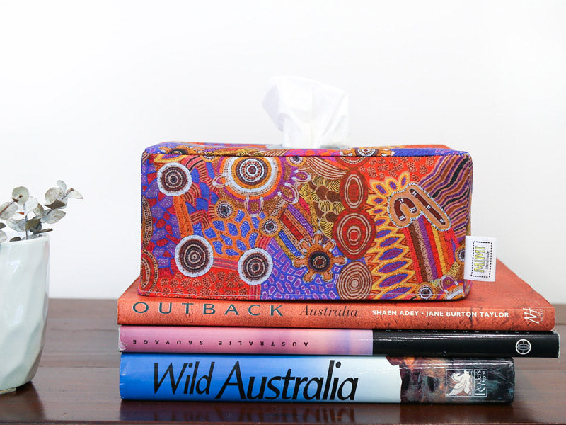 red-orange-indigenous-rectangular-tissue-box-cover-book-stack-display